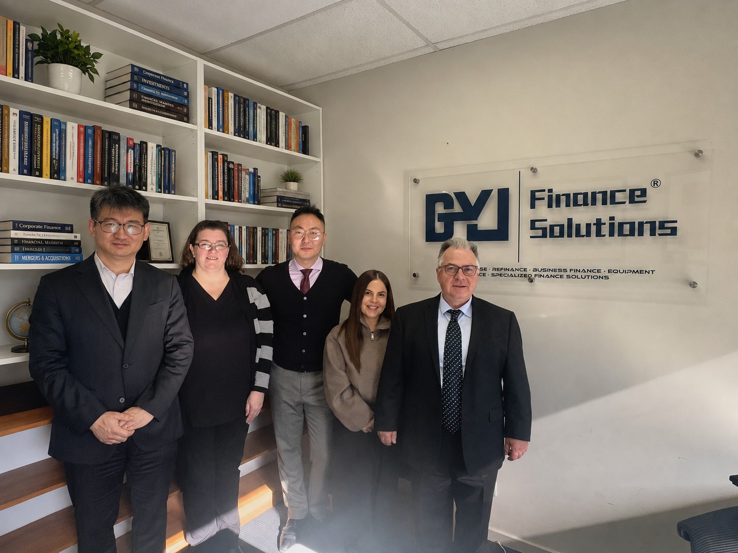 Jason Bai and the BYJ Finance Solutions team
